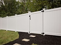 <b>White vinyl privacy fence with single gate and Contemporary post caps</b>
